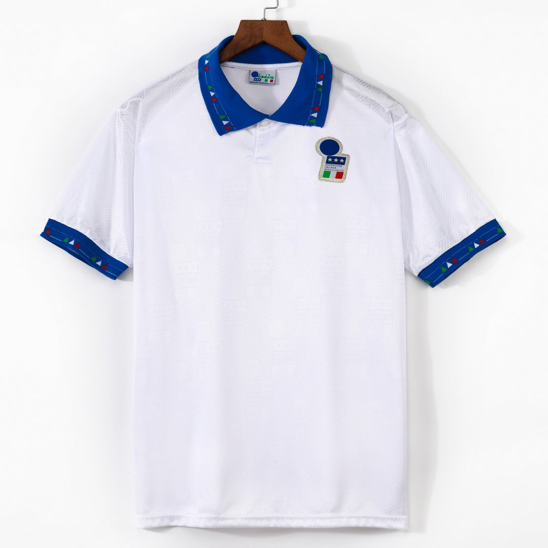 Maillot extérieur rétro de 1994 de l'équipe d'Italie, marque Le 12, affichant les couleurs nationales et le design vintage.