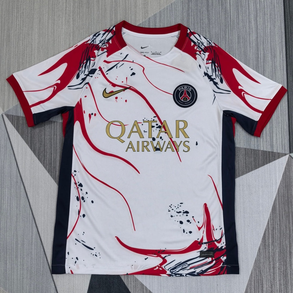 Maillot PSG blanc 25/26 Le 12 -ème Maillot, maillot de football pour jeunes, visible en détail sur l'image.