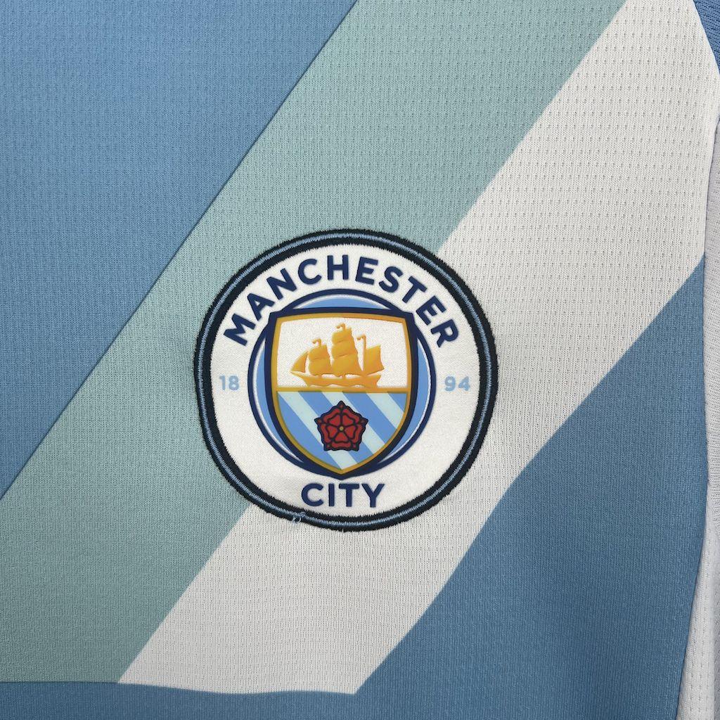 Maillot Manchester City 2025-26 de Le 12 -ème Maillot avec logo et design moderne, vue frontale sur le maillot de football.