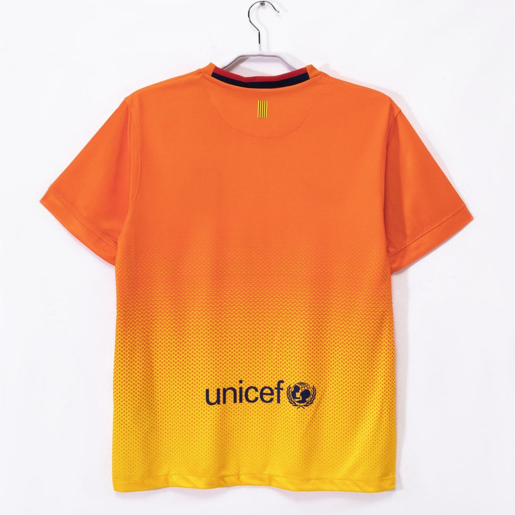 Maillot extérieur rétro du FC Barcelone 2012-2013 de la marque Le 12, vue de face avec logo et détails de l'équipe.