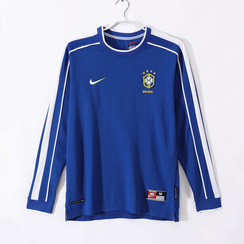 Maillot extérieur rétro du Brésil 1998 avec manches longues, couleur jaune et détails traditionnels, par Le 12 -ème Maillot.