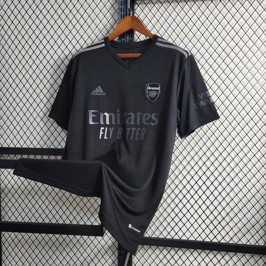 Maillot de football Arsenal 2023 2024 noir, marque Le 12 -ème Maillot, vue de face avec logo et détails du maillot.