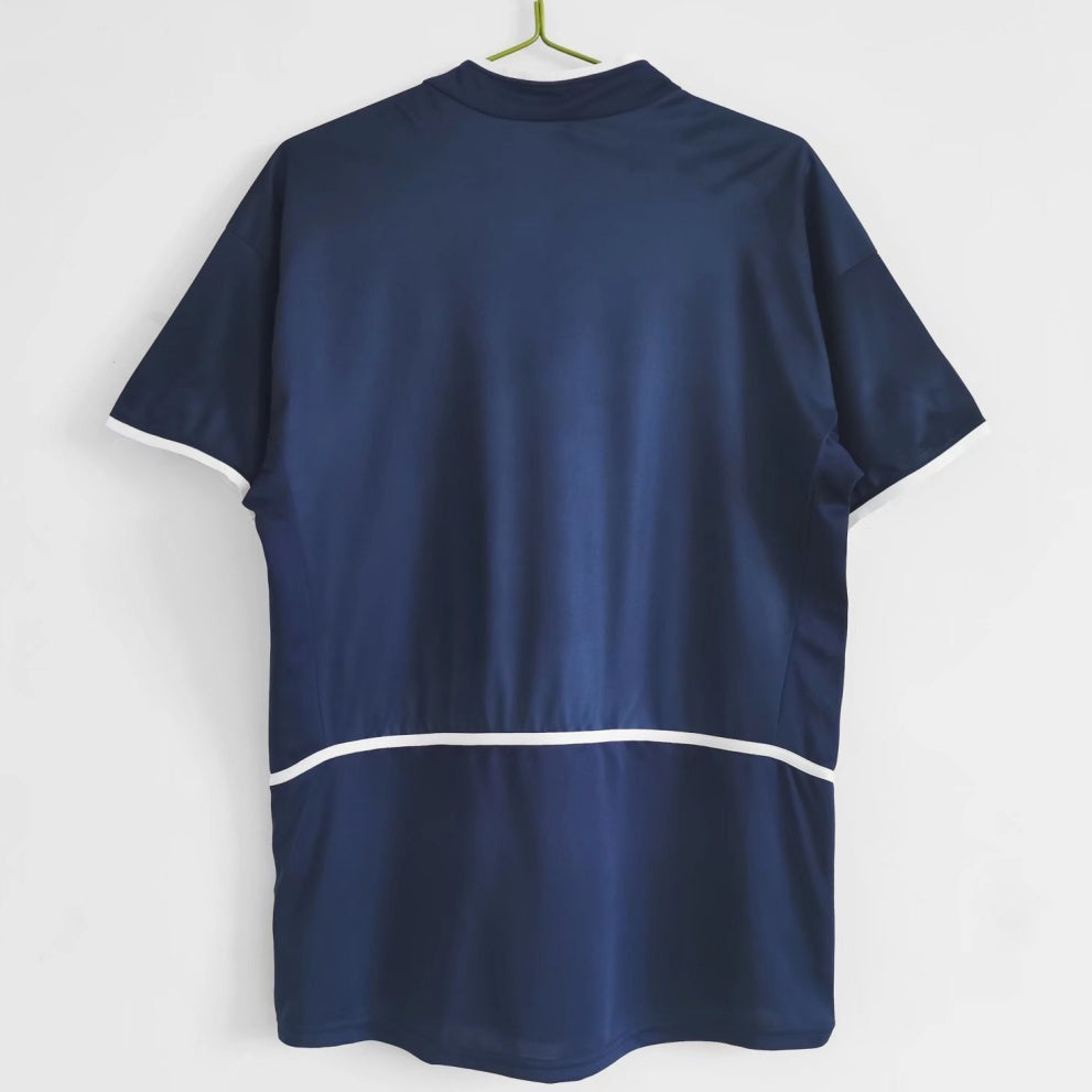 Maillot domicile rétro PSG 2002-2003 Le 12 -ème Maillot, maillot de football avec logo et design classique.