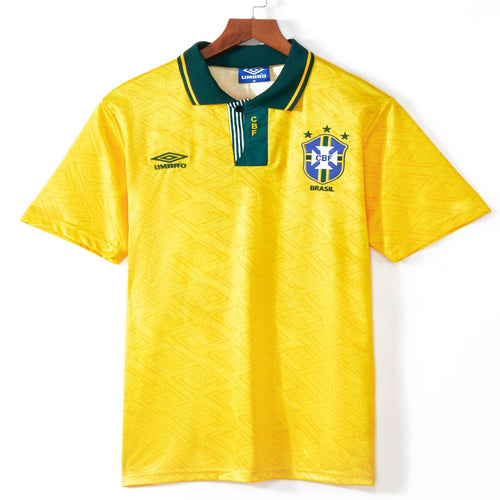 Maillot domicile rétro du Brésil 1993-1994 signé Le 12 -ème Maillot, maillot de football avec couleurs brésiliennes et logo visible.