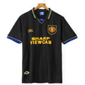 Maillot extérieur rétro Manchester United 1993-1994, marque Le 12-ème Maillot, vue de face avec logos et détails classiques.