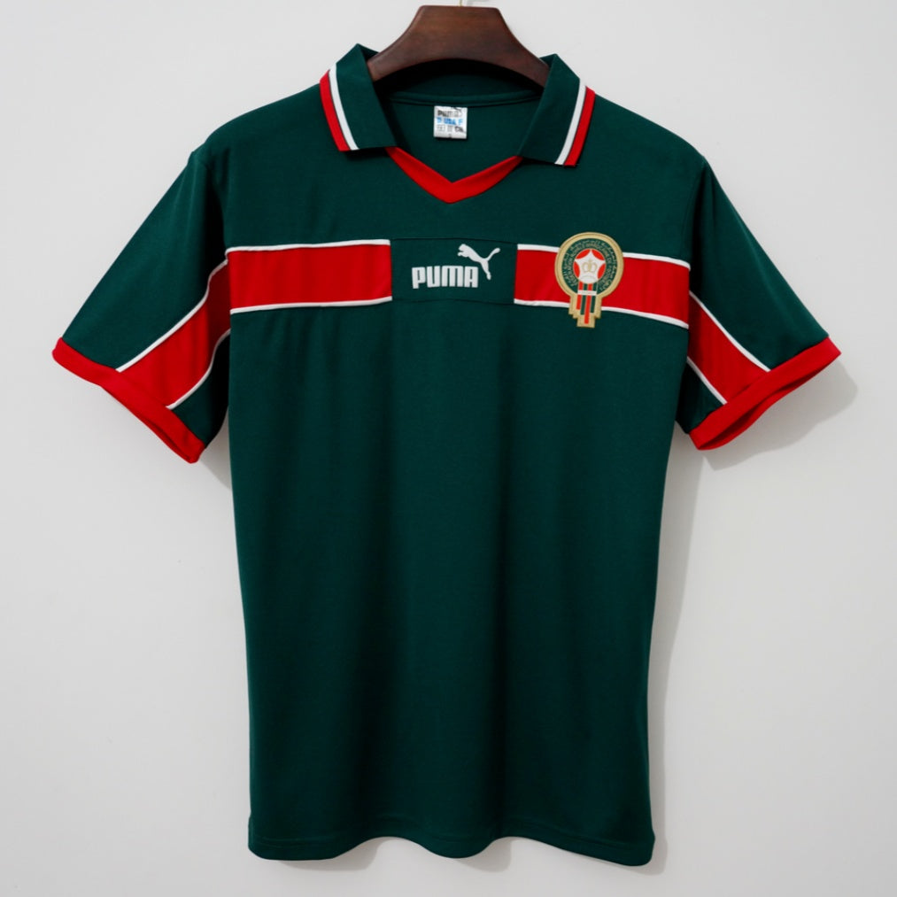 Maillot 1998 Maroc Domicile Retro Le 12ème Maillot, maillot de football avec couleurs officielles et logo de l'équipe nationale.