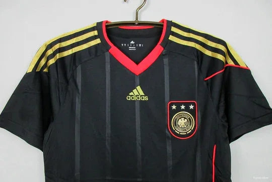 Maillot Allemagne rétro 2010 de la marque Le 12, devant du maillot avec design classique et logo national visible.