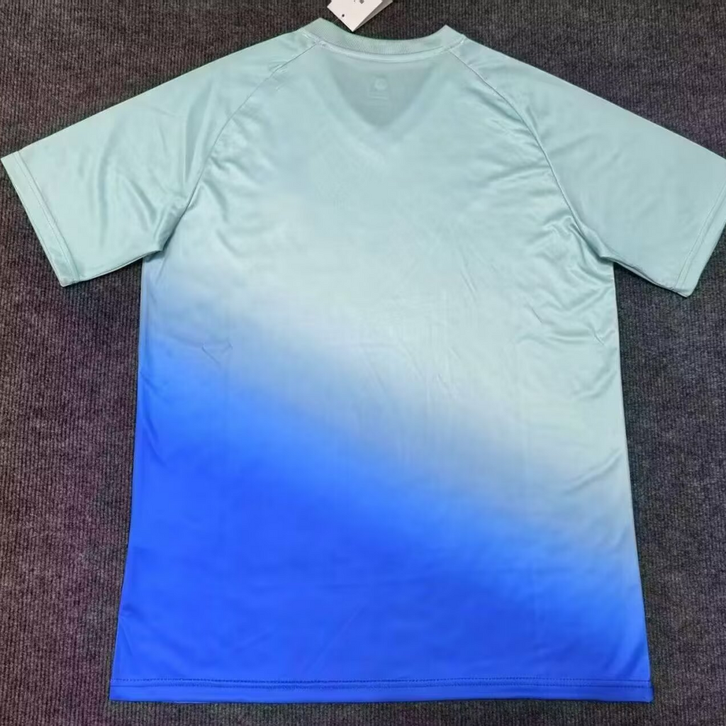Maillot de football 25/26 Maroc Le 12 -ème Maillot, bleu, avec logo national, vue de face sur fond blanc.