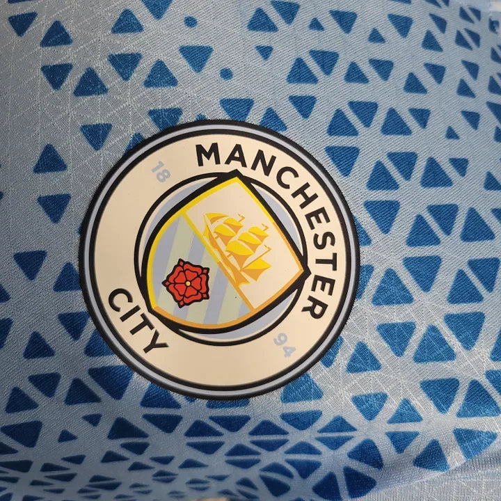 Maillot Manchester City 2023 2024 Le 12 -ème Maillot, maillot de football avec logo et design officiel en image.