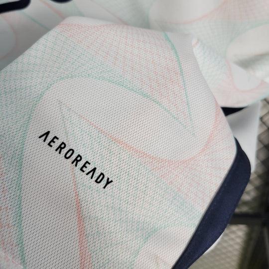 Maillot extérieur de l'Ajax 2023-2024, marque Le 12 -ème Maillot, avec design aux couleurs de l'équipe.