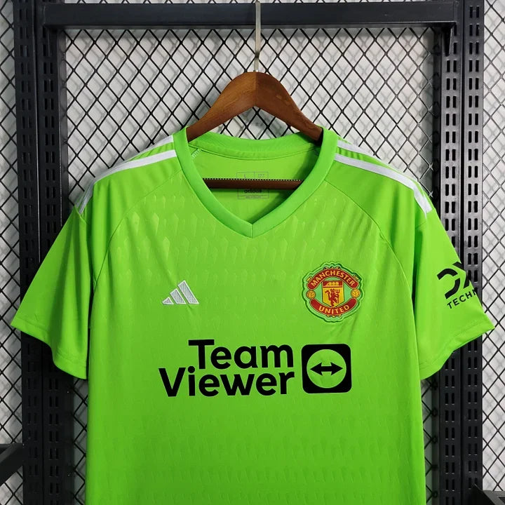 Maillot domicile Manchester United 2023-2024 de la marque Le 12 -ème Maillot, vue de face avec logo et détails du design.