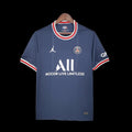 Maillot domicile PSG 21/22 Le 12 -ème Maillot, maillot de football bleu avec logo du Paris Saint-Germain et détails rouges.