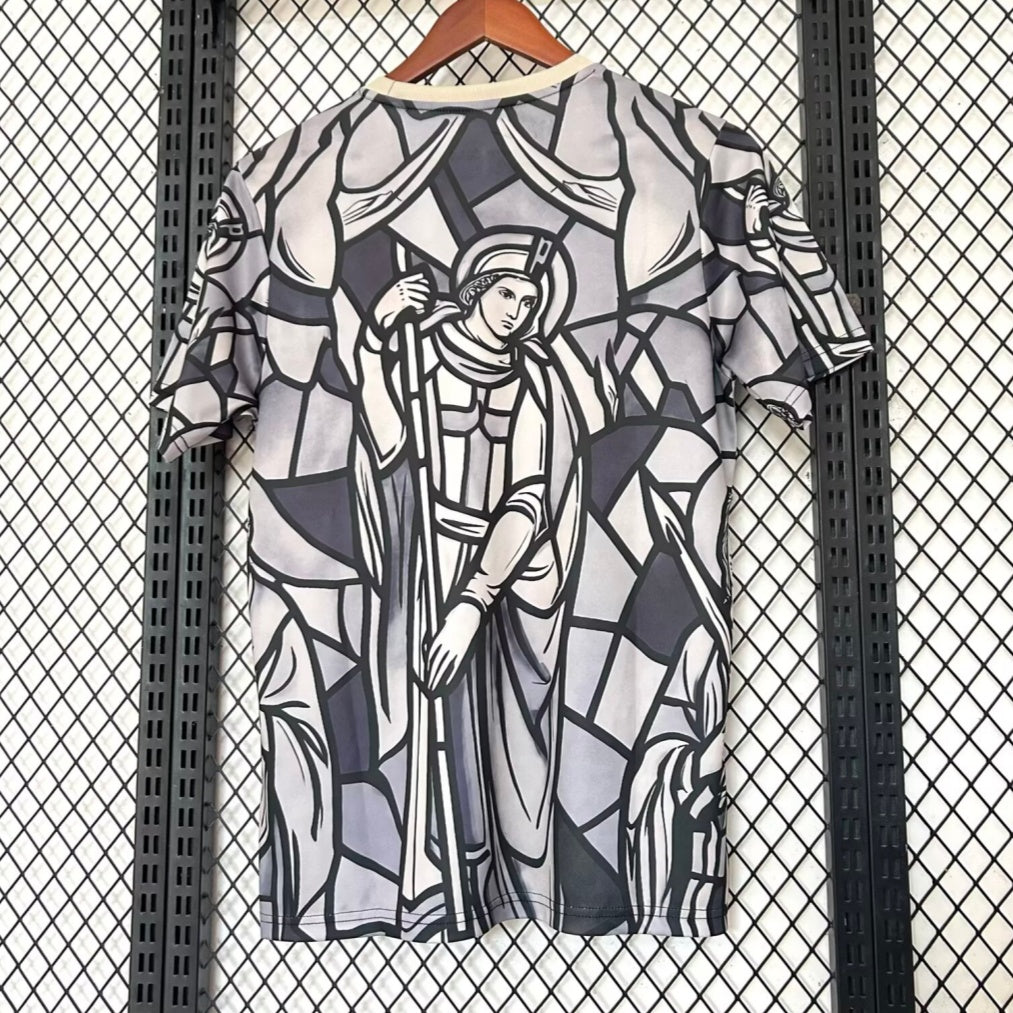 Maillot de football gris 25/26 de l'Angleterre, marque Le 12 -ème Maillot, vue de face avec logo et détails du design.