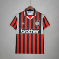 Maillot Manchester City rétro 94/96 Le 12 -ème Maillot, maillot de football bleu avec logo de l'équipe et détails vintage