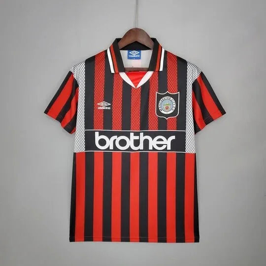 Maillot Manchester City rétro 94/96 Le 12 -ème Maillot, maillot de football bleu avec logo de l'équipe et détails vintage
