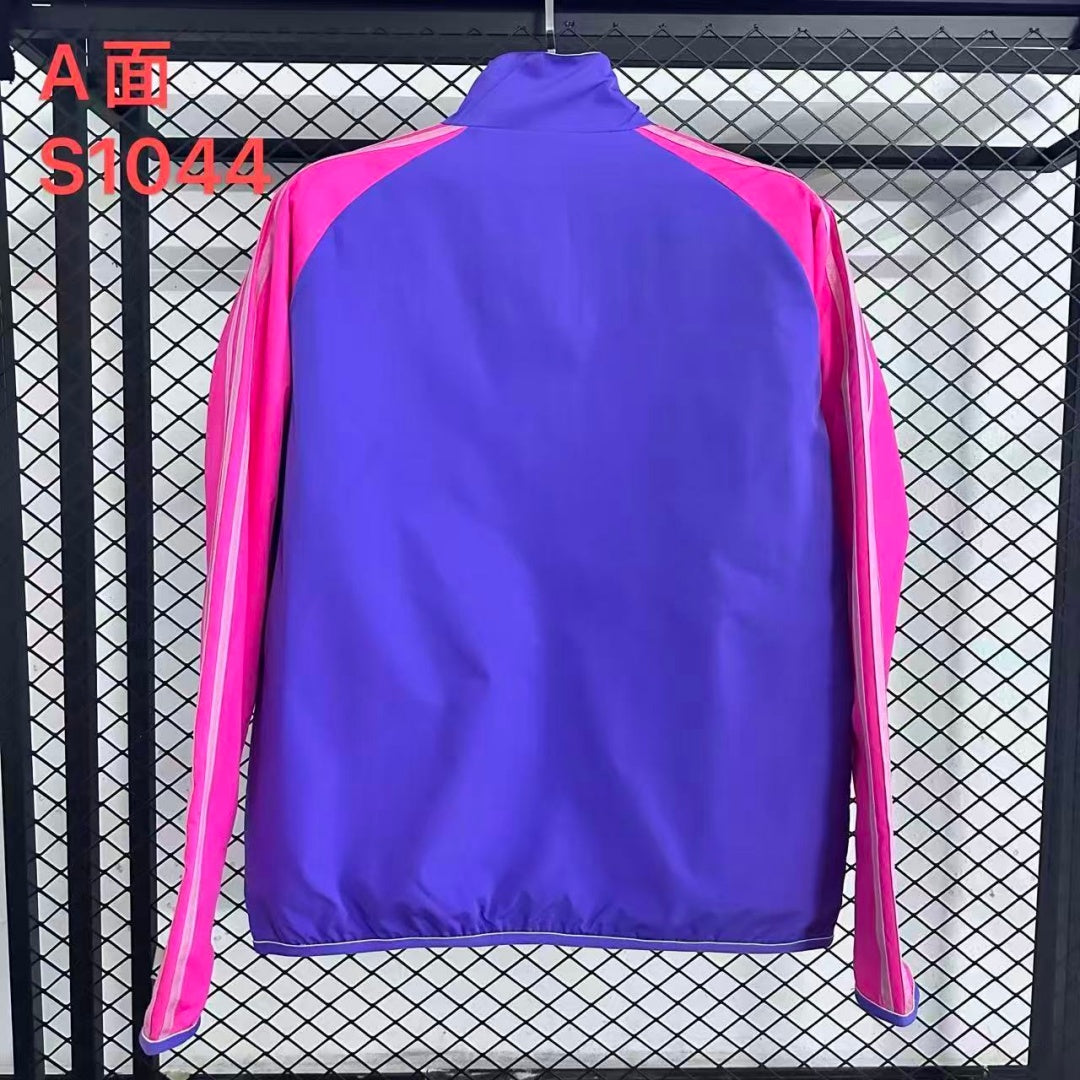Veste coupe-vent réversible Le 12 -ème Maillot Allemagne, tissu léger, design coloré, vue de face avec fermeture éclair visible.