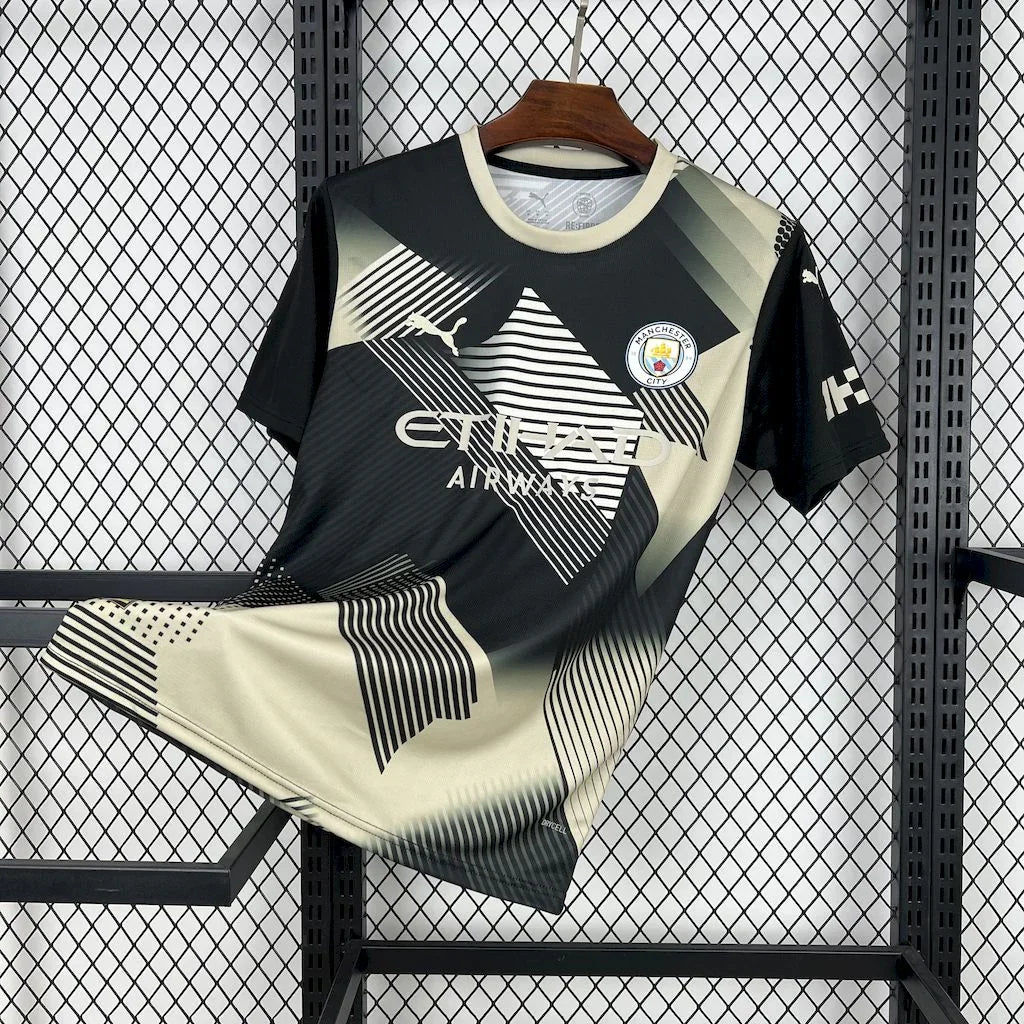 Maillot de football Manchester 25-26 ans, marque Le 12 -ème Maillot, jersey avec logo et détails de l'équipe.