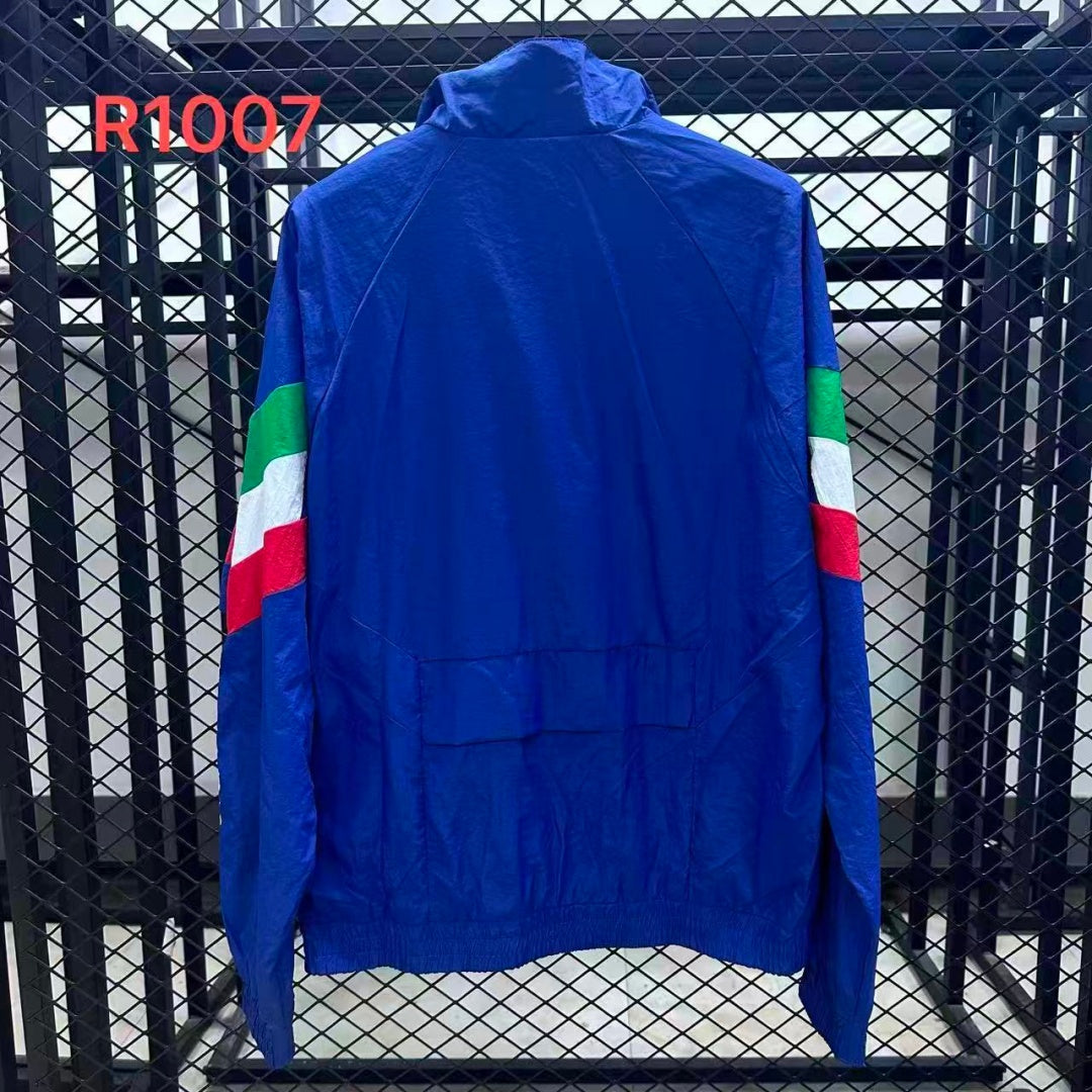 Veste coupe-vent réversible Le 12 -ème Maillot Italie, légère et résistante, montrant les deux faces dans une vue de face.
