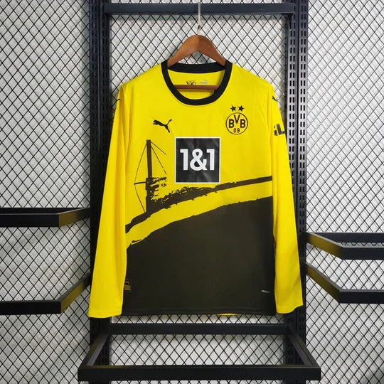 Maillot Dortmund 2023-2024 à manches longues, marque Le 12 -ème Maillot, bleu avec logo du club et détails sportifs.