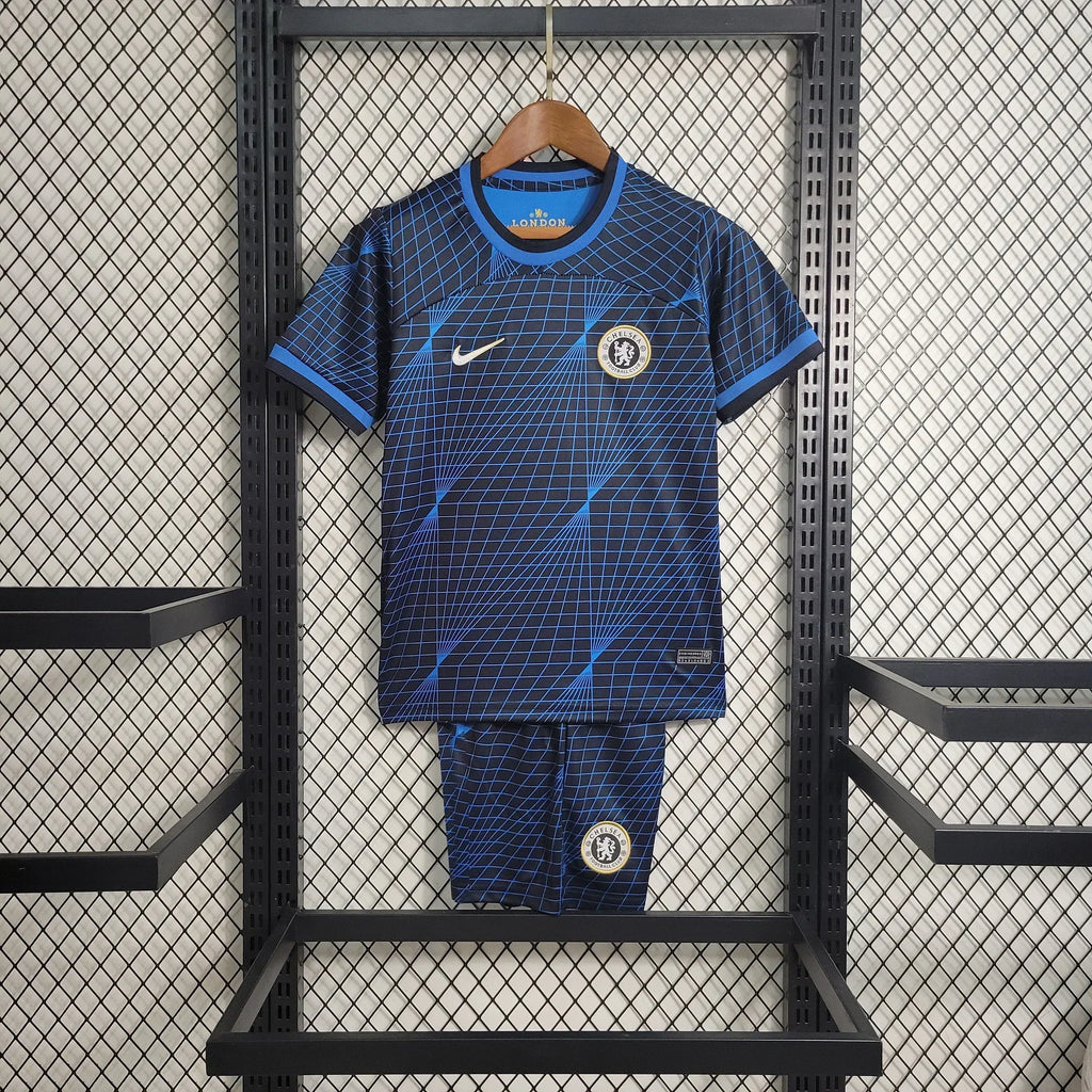 Ensemble pour enfant Chelsea de la marque Le 12 -ème Maillot, comprenant un haut et un pantalon en tissu confortable, couleur bleue.