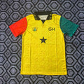 Maillot Burkina Faso jaune 25/26 Le 12 -ème Maillot, maillot de football avec logo et détails verts sur fond jaune.