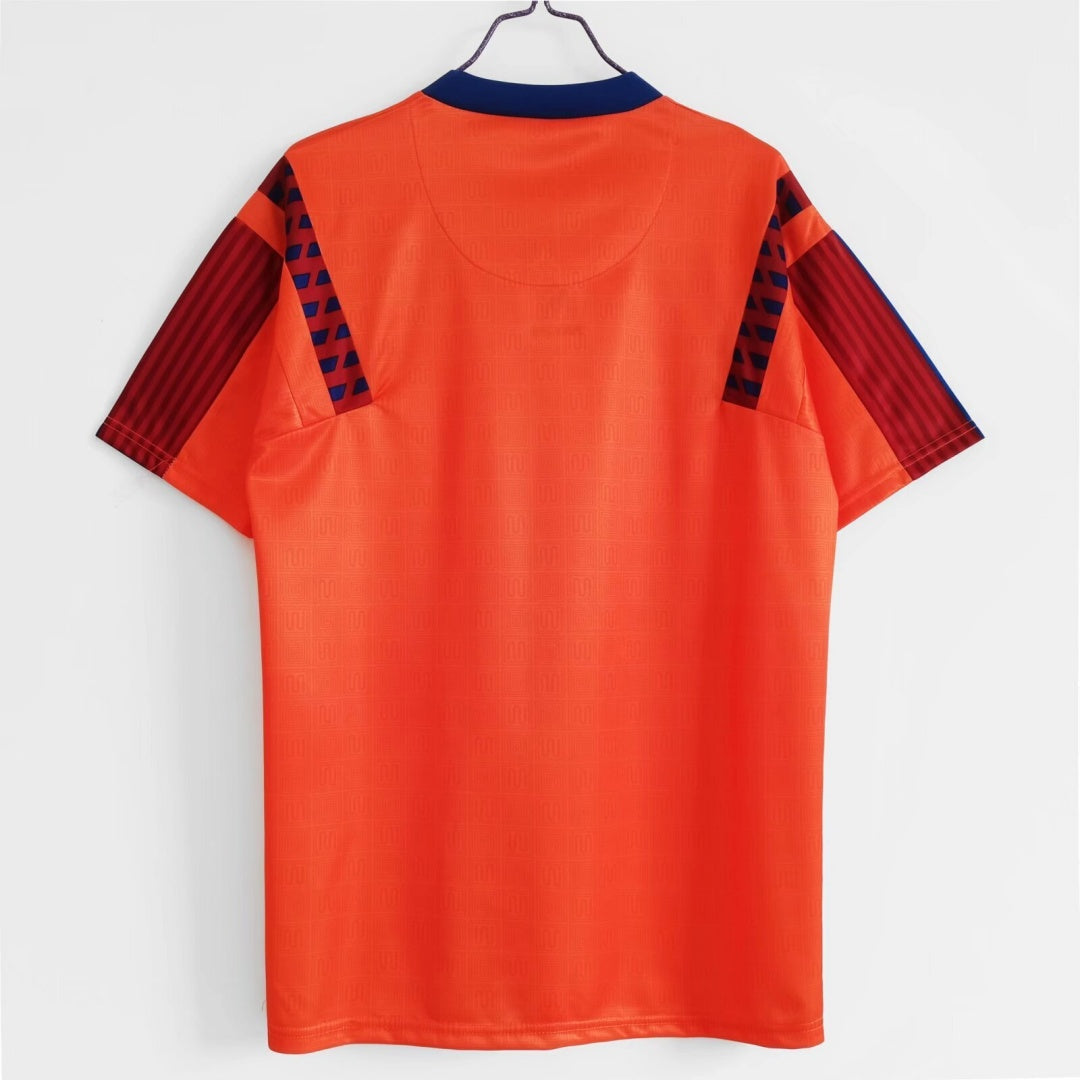 Maillot extérieur rétro du FC Barcelone 1991-1992, marque Le 12, en tissu bleu avec détails rouges, vue de face.