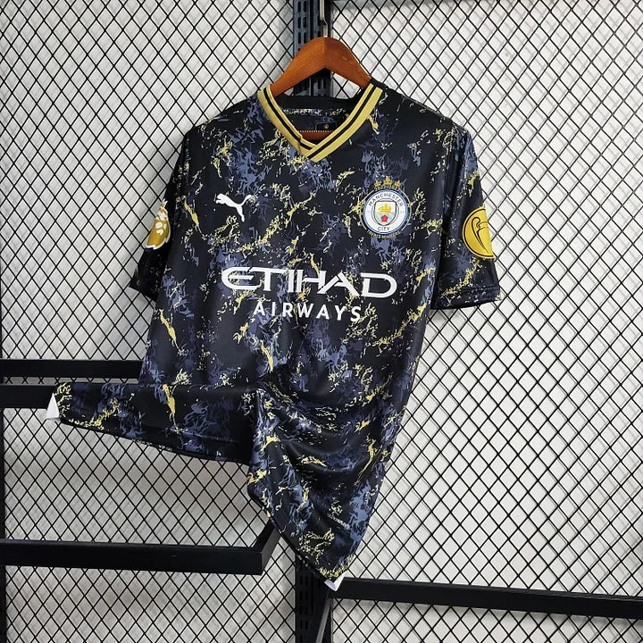 Maillot Manchester City saison 2023-2024, édition spéciale, fabriqué par Le 12 -ème Maillot, vue de face avec logos et détails colorés