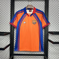 Maillot de football rétro FC Barcelone 1998, marque Le 12 -ème Maillot, vue de face avec logo et design classique.