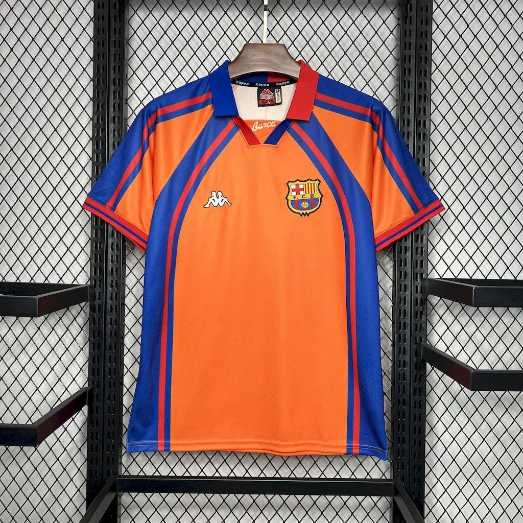 Maillot de football rétro FC Barcelone 1998, marque Le 12 -ème Maillot, vue de face avec logo et design classique.