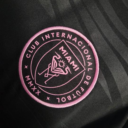 Maillot extérieur Inter Miami saison 2023-2024, marque Le 12 -ème Maillot, avec logo et design coloré.