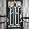 Maillot extérieur Manchester United 2023-2024 à manches longues, marque Le 12 -ème Maillot, vue de face avec logo et détails du maillot