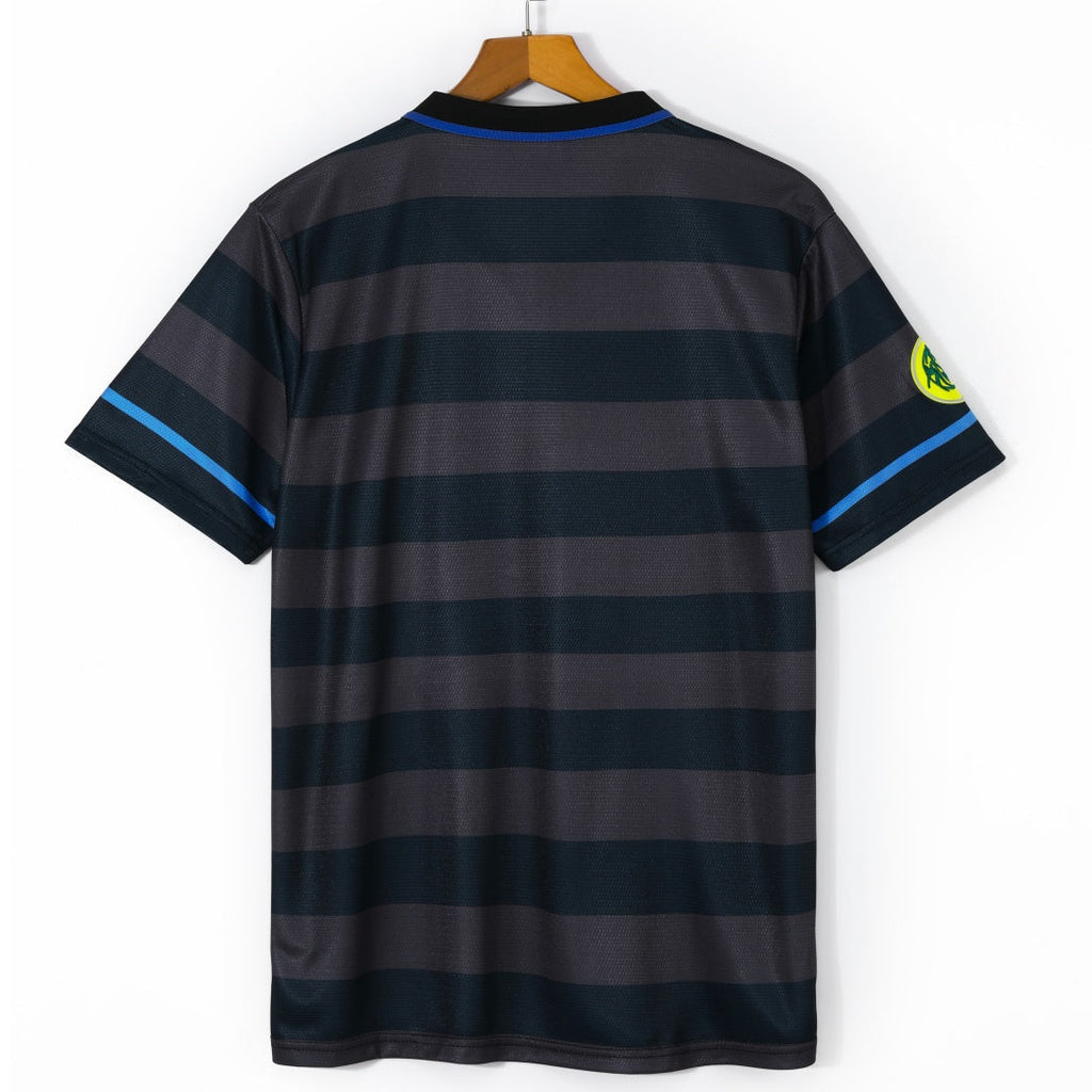 Maillot rétro Inter Milan troisième 1997-1998 Le 12, maillot de football orange avec logo et détails vintage.