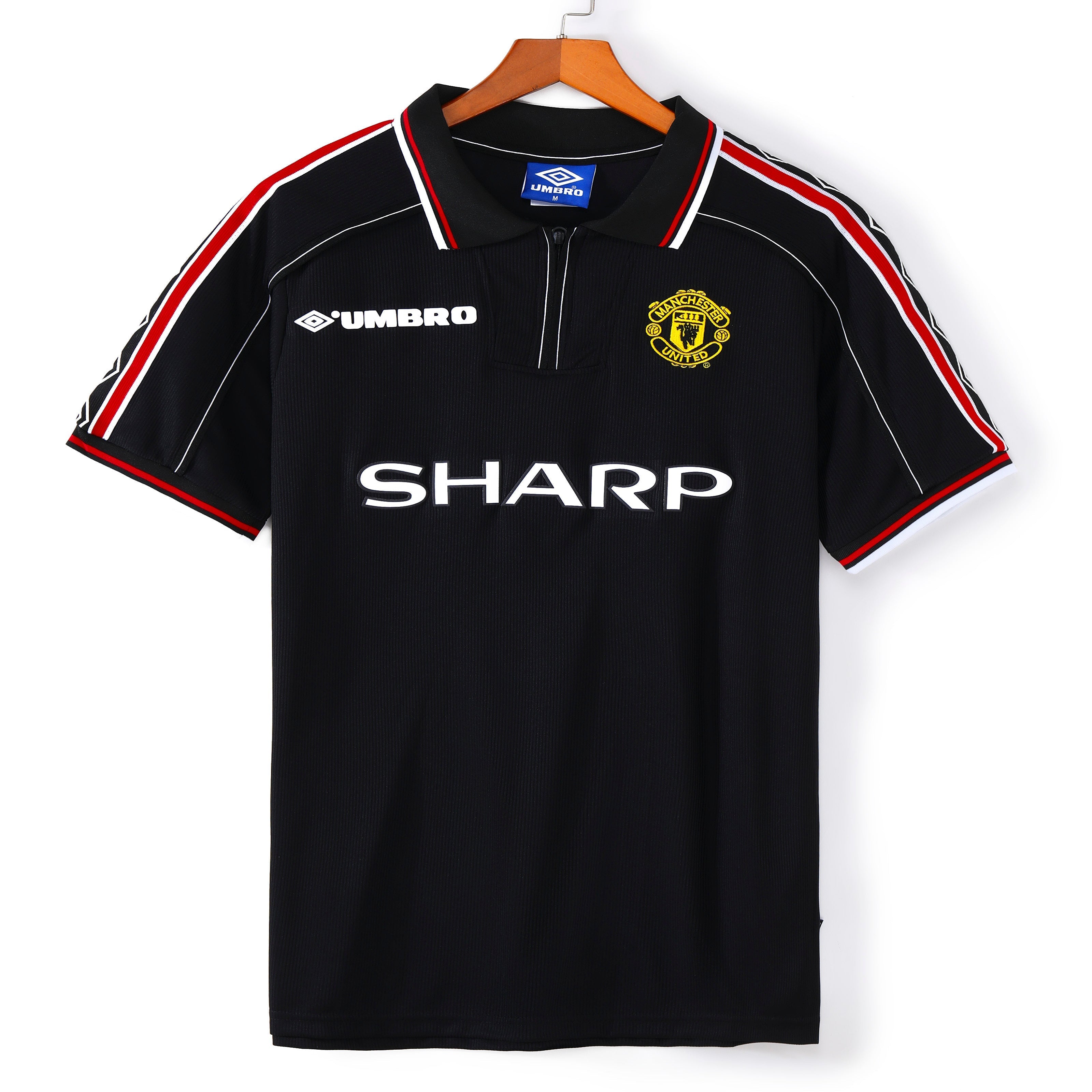 Maillot extérieur rétro Manchester United 1998-1999, marque Le 12-ème Maillot, avec logo et détails authentiques.