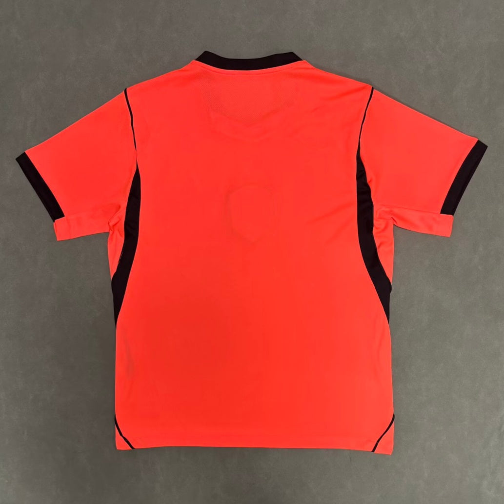 Maillot domicile Pays-Bas 25/26 de Le 12 -ème Maillot, vue de face avec détails du logo et des couleurs orange et bleu