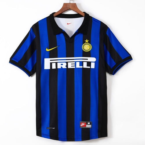 Maillot domicile rétro de l'Inter Milan 1998-1999, fabriqué par Le 12, avec les couleurs classiques et le logo du club.