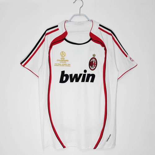 Maillot extérieur rétro AC Milan 2006-2007, marque Le 12-ème, vue de face avec logo et design classique.