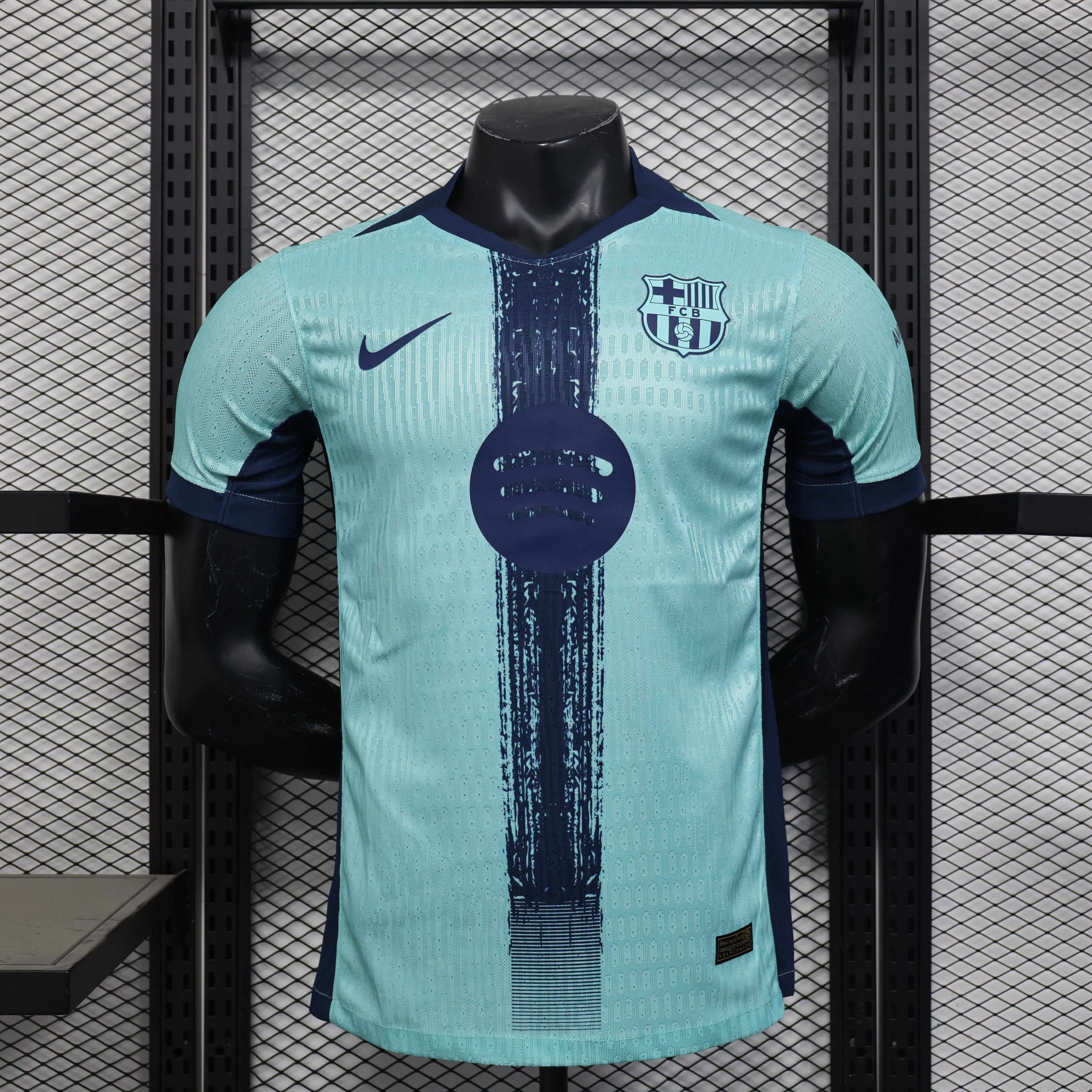 Maillot 25/26 Barcelone Player Le 12 -ème Maillot, maillot de football bleu avec logo et numéros, vue frontale.