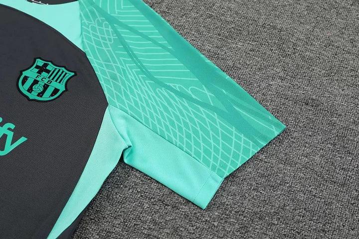 Maillot d'entraînement FC Barcelone 2023 2024 Le 12-ème, jersey de football avec logo du club et design moderne.