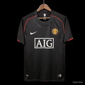 Maillot Manchester United rétro 2007-2008, marque Le 12-ème Maillot, vue de face avec logo et design classique.