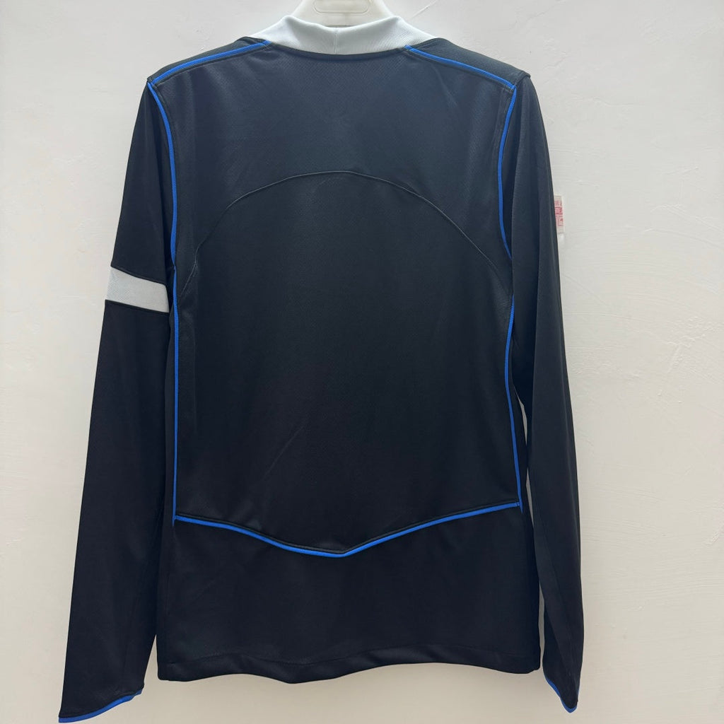 Maillot Chelsea Third 25/26 à manches longues, marque Le 12 -ème Maillot, en tissu bleu avec logo et détails du club.