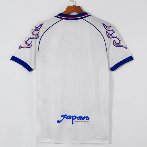 Maillot extérieur rétro du Japon 1998, modèle Le 12-ème Maillot, avec design vintage et couleurs traditionnelles.