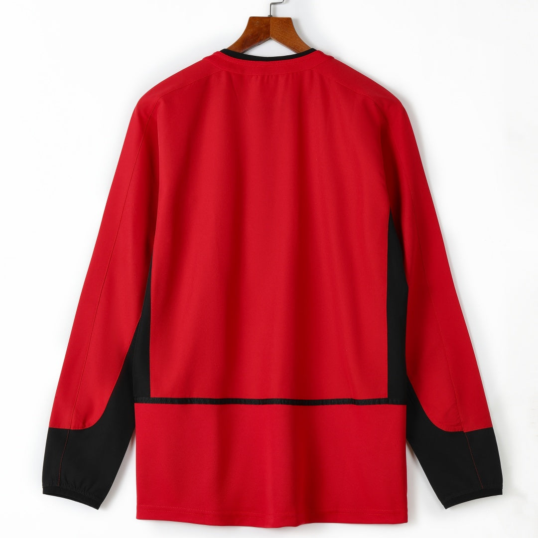 Maillot domicile rétro Manchester United 2002-2004 à manches longues, marque Le 12 -ème Maillot, détail visible sur l'image