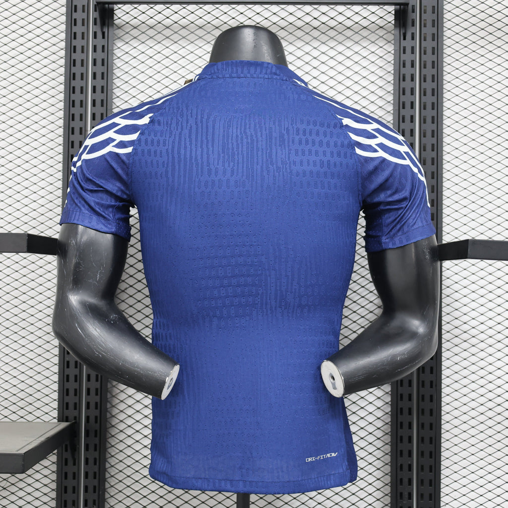 Maillot PSG 24/25 bleu Le 12-ème Maillot, maillot de football pour joueur, vue de face avec logo et détails du design.