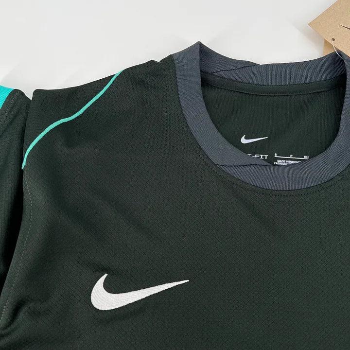 Maillot extérieur Liverpool FC 2024 2025 de la marque Le 12, vue de face avec logo et couleurs officielles.