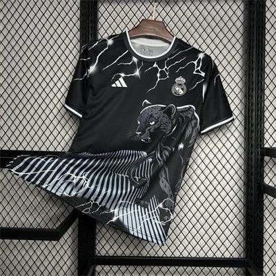 Maillot Real Madrid noir et gris Panther 2024/25 de Le 12 -ème Maillot, vue front avec logo et détails du design.