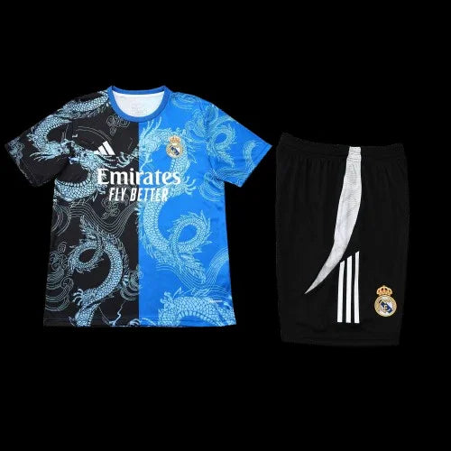 Maillot Real Madrid de l'ensemble Le 12-ème Maillot, vue de face avec logo et détails du maillot blanc et bleu.