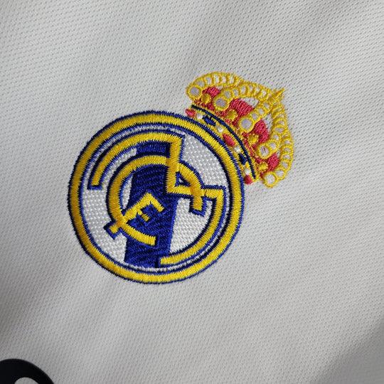 Maillot Real Madrid 2023 2024 à manches longues, marque Le 12 -ème Maillot, vue frontale avec logo et design officiel