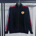 Veste coupe-vent réversible Manchester United Le 12 -ème Maillot, tissu léger avec logos de l'équipe sur les deux côtés