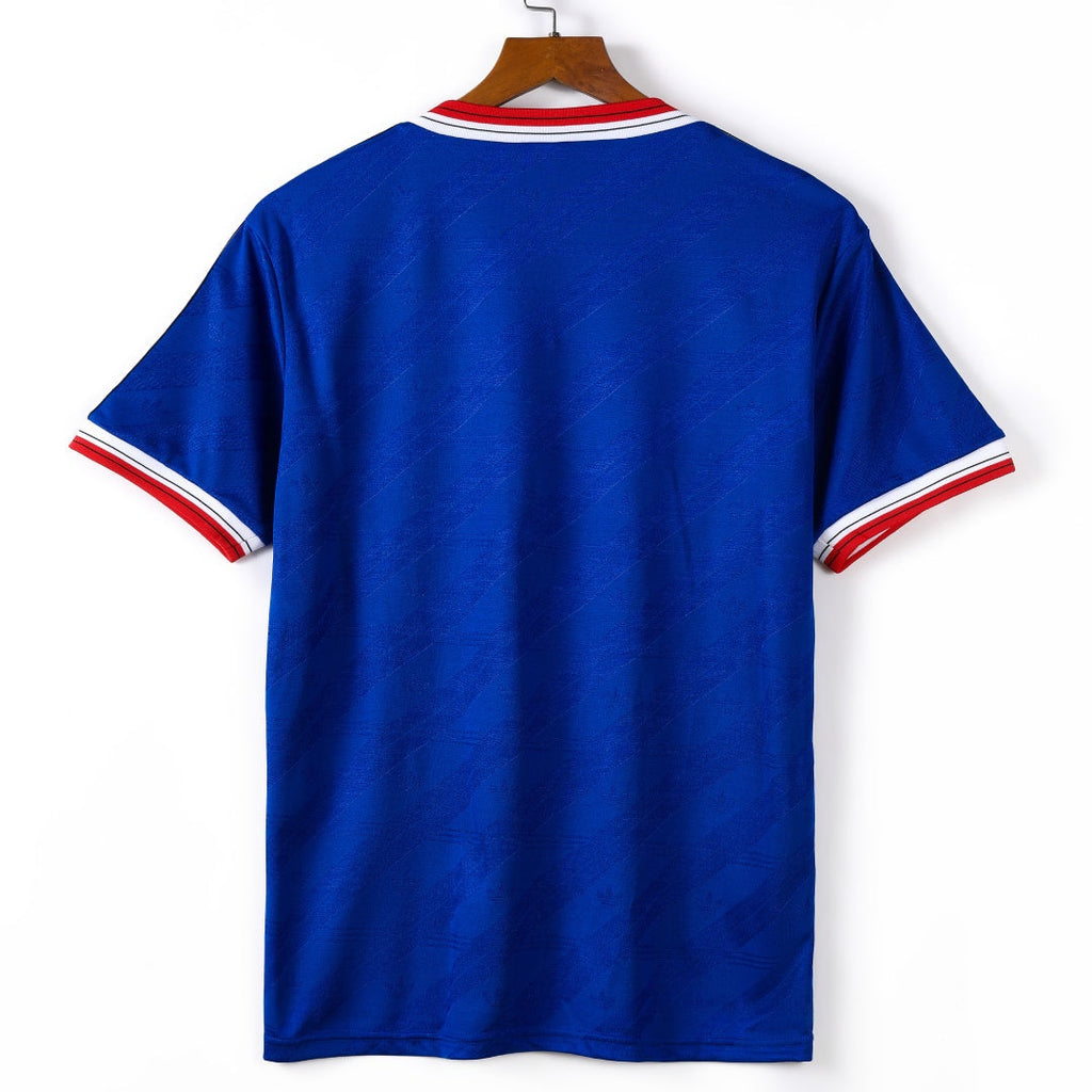 Maillot Manchester United third rétro 1986-1988, marque Le 12-ème Maillot, vue de face avec logo et détails du maillot.