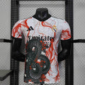 Maillot de football Real Madrid 25-26 de la marque Le 12 -ème Maillot, vue du devant avec logo et détails colorés